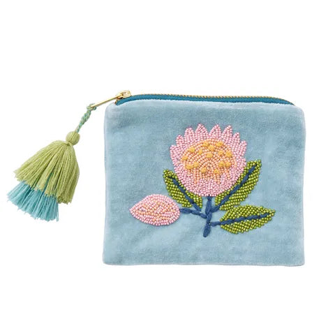 Blue velvet zip pouch with embroidered and beaded protea motif and cotton tassels