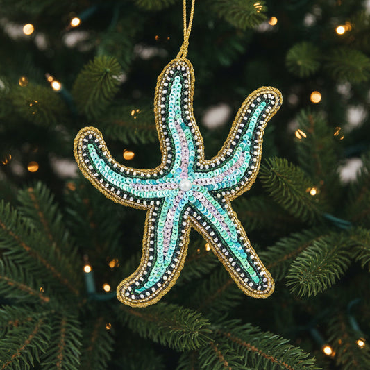 Beaded starfish Christmas decoration hanging on a Christmas tree